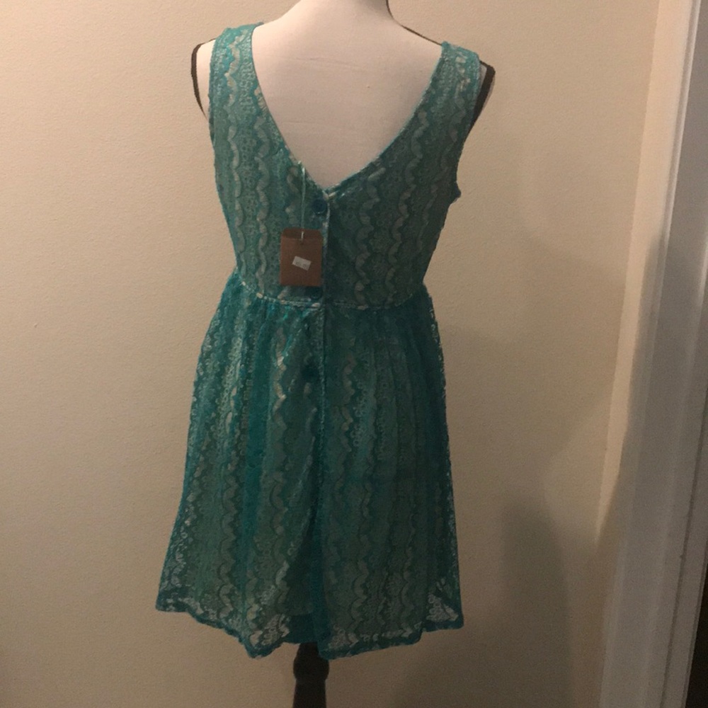 Turquoise lace dress size L.